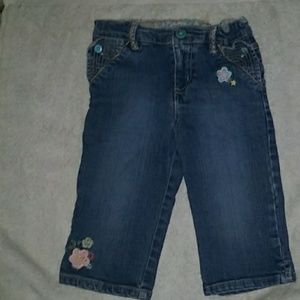blue jean capris with embroidered flowers